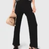 Pantalon en maille ornée de bijoux