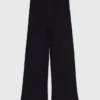 Pantalon en maille ornée de bijoux