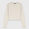 Pull avec broche florale Pull avec broche florale