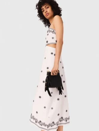 Robe longue à découpes brodées