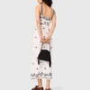Robe longue à découpes brodées