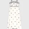 Robe longue à découpes brodées