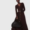 Robe mi-longue en maille avec boutons Robe mi-longue en maille avec boutons