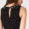 Robe patineuse ornée de bijoux