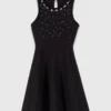 Robe patineuse ornée de bijoux