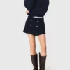 Short en tweed avec ceinture contrastée