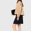 Veste avec col contrasté amovible