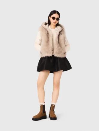 Veste courte en fausse fourrure