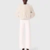 Veste courte en fausse fourrure