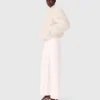 Veste courte en fausse fourrure