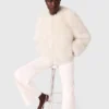 Veste courte en fausse fourrure
