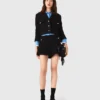 Veste courte en tweed à strass