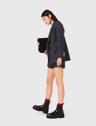 Veste de costume à boutons dorés
