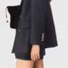 Veste de costume à boutons dorés