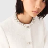 Veste en tweed avec bordure en perles