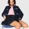 Veste en tweed avec bordures en denim