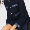 Veste en tweed avec bordures en denim